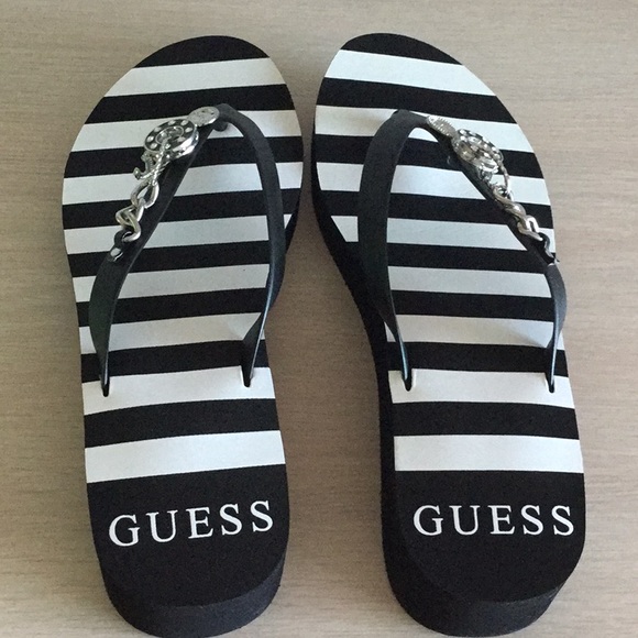 guess flip flops with charms